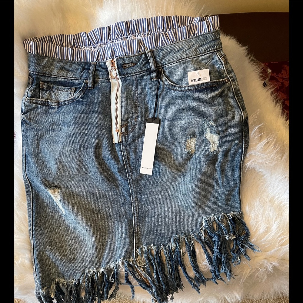William Rast Fringe Asymmetric hem denim skirt.